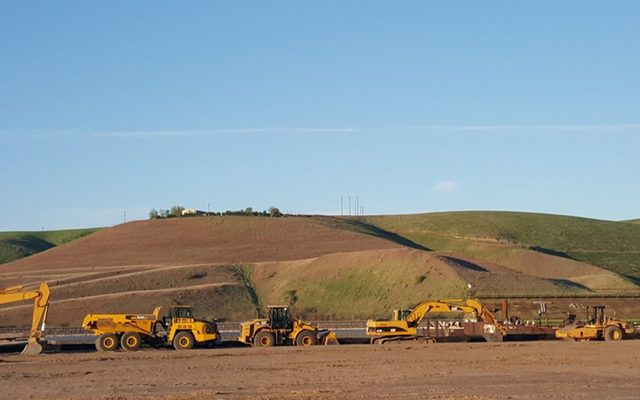 WCI scraper and dozer fleet moving earth on a mass grading project in the LC Valley