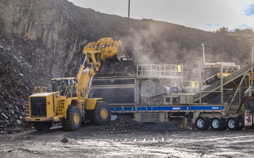 Wheel loader feeding a mobile crushing plant at a WCI rock crushing operation